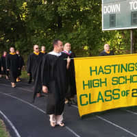 <p>The Hastings High School faculty and administration carry the school colors.</p>