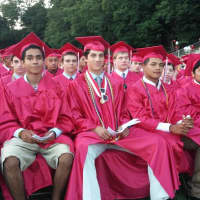 <p>Students listen to the class leaders at Thursday&#x27;s graduation at Sleepy Hollow High School.</p>