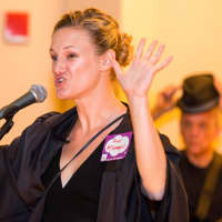 <p>Margaret Middleton, executive director of the Connecticut Veterans Legal Center, speaks at the gala.</p>