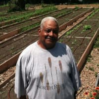 <p>Fairgate Farm Manager Bill Callion with vegetables growing behind him at Fairgate Farm. Located at 129-143 Stillwater Ave., it is having a free public event called &quot;It Isn&#x27;t Easy Being Green,&quot; Saturday from noon until 2 p.m.</p>