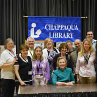 <p>Hillary Clinton poses for photos with the Chappaqua Library staff.</p>