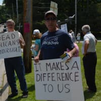 <p>Protesters came to Chappaqua the day that Hillary Clinton held a book signing at the library.</p>