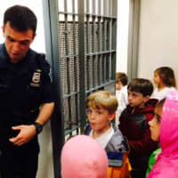 <p>Chapel School kindergarten students get a tour of the police cells in Tuckahoe.</p>