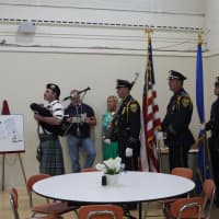 <p>The officers being promoted start the ceremony Monday night with an Honor Guard and a bagpiper. </p>