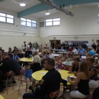<p>A flood of family members, friends and well-wishers gather at the Fairfield Senior Center for the promotion ceremony Monday night. </p>