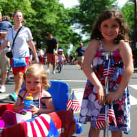 <p>Piper and Lauren Savino enjoying the festivities at the 2013 Push-n-Pull Parade.</p>