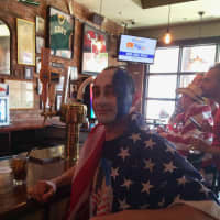 <p>Stratford resident Ryan Swoszowski painted his face and head with red, white and blue to watch the USA v. Belgium game at Fairfield&#x27;s Colony Grill. </p>