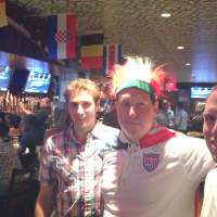 <p>Bobby Bannon (center) dresses up for every USA World Cup game, including at Ron Blacks in White Plains July 1.</p>