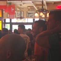 <p>Fans react to USA&#x27;s loss Tuesday against Belgium in the World Cup Round of 16. </p>