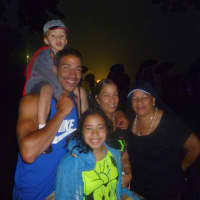 <p>Families braved the weather and watched the fireworks from the fields behind White Plains High School. </p>