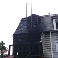 <p>There is heavy damage following a fire  at a commercial/residential building at 58 Main Street in Hastings-on-Hudson.</p>