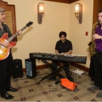 <p>Music Conservatory of Westchester jazz guitar teacher Rale Micic of Manhattan performs 
with students Anabhuv Guha of Chappaqua and Zach Berro of Armonk. 

</p>
