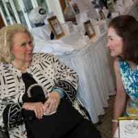 <p>Barbara Cook chats with Armonk resident Jennifer Weiss. </p>
