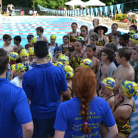 <p>Chappaqua swimmers huddle.</p>