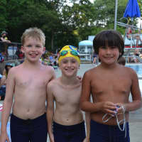 <p>Three swim amigos pose at the Chappaqua-Yorktown swim meet.</p>