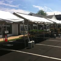 <p>Darien businesses had set up their tents outside Wednesday in preparation for the Thursday start of the Sidewalk Sales and Family Fun Days.</p>