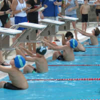 <p>Yorktown and Willowbrook swimmers get set for a race at a dual meet in Mount Kisco on Tuesday, July 8.</p>