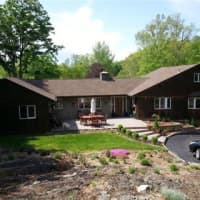 <p>This house at 30 Pheasant Run Road in Pleasantville is open for viewing on Sunday.</p>