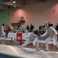 <p>Sylvie Binder, left, is pictured fencing Iman Blow of New York City in the finals of the Womens Junior team competition.</p>