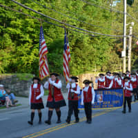 <p>The Ancient Fife and Drum Corps marches in the parade.</p>