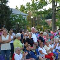 <p>Onlookers applaud during Mount Kisco&#x27;s parade.</p>