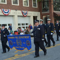 <p>Ossining firefighters march in Mount Kisco&#x27;s parade.</p>