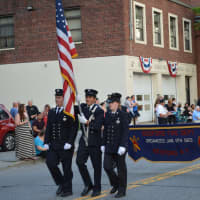 <p>Bedford firefighters march in Mount Kisco&#x27;s parade.</p>