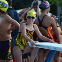 <p>Swimmer heads for the starting podium in Chappaqua Swim &amp; Tennis meet with Briarcliff.</p>