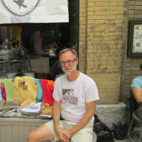 <p>Barry Wells was selling shirts for Breakneck Ridge. </p>