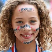 <p>Kiara Cekic&#x27;s shows her passion for the cause -- swimming for Swim Across America at Chappaqua Swim &amp; Tennis Club, July 13.</p>