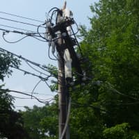 <p>A utility pole is damaged on Stanley Avenue at the corner of Palmer Avenue. </p>