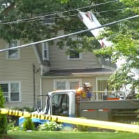 <p>Con Edison crews work on power outages in Mamaroneck Monday. </p>