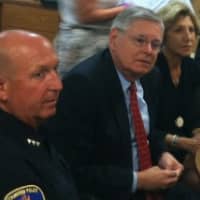 <p>Stamford Mayor David Martin, center, flanked by Police Chief Jonathan Fontneau and Sandy Goldstein, president of the  Downtown Special Services District, listens during a meeting to discuss a shooting in Columbus Park early Sunday.</p>