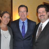 <p>Pictured from left: Fairfield Police Detective Kerry Dowling, Gov. Dannel Malloy and Anthony Iannini of Trumbull, a member of the centers board of directors.
</p>