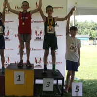 <p>Wilton Running Club&#x27;s Sean McHale, right, qualified for the Junior Olympic national championships in the 1,500 of the 11-12 age group.</p>