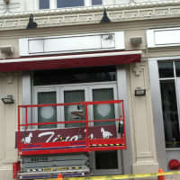 <p>The &quot;Tino&#x27;s&quot; sign sits on a platform after it was removed as the nightclub owners decided to give up their liquor permit and close it following outrage about a shooting Sunday that wounded five outside. </p>