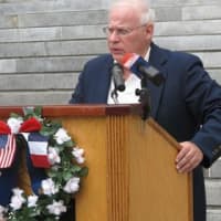 <p>Sister City Committee Chairman Peter Korn speaks on &quot;Why We Celebrate Bastille Day&quot;</p>