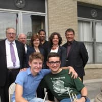 <p>La Rochelle student musicians Pierrick Dubreuil and Hugues Sarrat, with Sister City Committee member and guest speaker James Kaplan and Convenor Peter Korn; Brian Carter, New York State Sen. George Latimer and Raffaela Cersosino and Christine.</p>