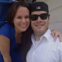 <p>Yankee fan Mark Columbano with his girlfriend Alicia, said he enjoyed Derek Jeter&#x27;s performance outside of Smokehouse in New Rochelle.
</p>