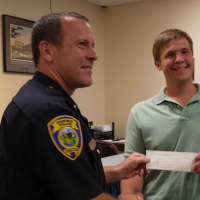 <p>Christopher Bodnar of Trumbull, who is planning to study business at Penn State, received a $500 scholarship from the Fairfield Police Union.</p>
