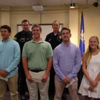 <p>Christopher Rubis, Christopher Bodnar, Tyler Caruso and Erin Broderick all received $500 scholarships from the Fairfield Police Union, handed out by Lt. Keith Broderick and Chief Gary MacNamara.</p>