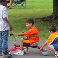 <p>Carlos, Jimmy and Erik enjoyed the outdoors in New Rochelle rather than listen to the music.</p>