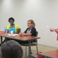 <p>Lisa Buck, right, director of The Bridge Fund of Westchester and chairperson for the Nonprofit Westchester Policy Committee, introduces the speakers of the Hot Topics Policy Briefing.</p>