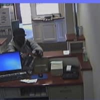 <p>Surveillance footage of the man who police said robbed the First County Bank in Norwalk Thursday morning.</p>