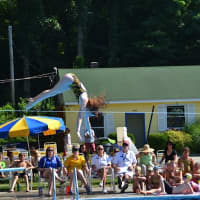 <p>Chappaqua diver bends for entry in a meet against Katonah.</p>