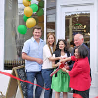 <p>With her husband Dee, Alina Lawrence, owner of Olivette, cuts the ribbon of her new store with Westport First Selectman Jim Marpe and State Rep. Gail Lavielle and State Sen. Toni Boucher. </p>