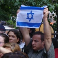 <p>Dozens of residents showed support for Israel Thursday in White Plains. </p>