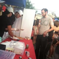 <p>Pizza was a popular attraction as people lined up to grab a slice</p>