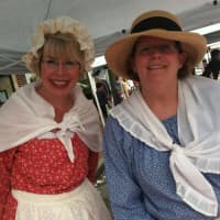 <p>New Canaan Historical Society board members and volunteers Susan Serven and Robin Wolyner helped out at the society&#x27;s booth at the New Canaan Village Fair and Sidewalk Sale on Saturday.</p>