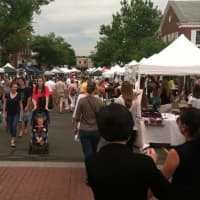 <p>The view on Elm Street In New Canaan during the Village Fair and Sidewalk Sale on Saturday.</p>